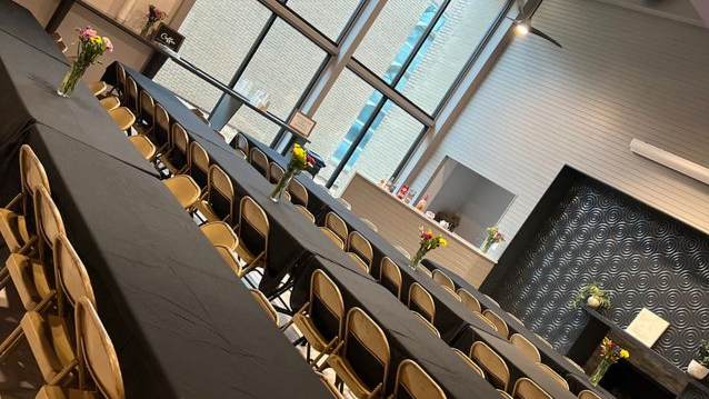 Event space set for 88-tables & chairs and tablecloths